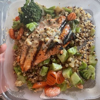 The Corner Pub and Grill - A $19 salmon bowl and it doesn't even cover the entire carry out box..... really? Not ok. - Sports Bars Near Me - O'fallon, Missouri The Corner Pub and Grill - A $19 salmon bowl and it doesn't even cover the entire carry out box..... really? Not ok. - Sports Bars Near Me - O'fallon, Missouri