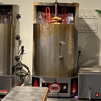 Donair Delight - a commercial kitchen with a large pot of hotdogs - Middle Eastern Near Me - Burnaby, British Columbia