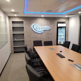 St. Germain Electric - Commercial conference room with color changing recessed and accent trough lightening, back light signage, table top power and network ports - Electricians Near Me - Boston, Massachusetts St. Germain Electric - Commercial conference room with color changing recessed and accent trough lightening, back light signage, table top power and network ports - Electricians Near Me - Boston, Massachusetts
