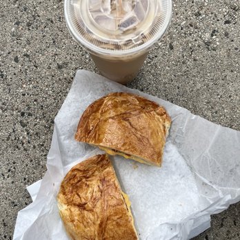 Donut Capital - caramel iced coffee and breakfast combination croissant with bacon, ham, egg, & cheese - Donuts Near Me - Paramount, California Donut Capital - caramel iced coffee and breakfast combination croissant with bacon, ham, egg, & cheese - Donuts Near Me - Paramount, California
