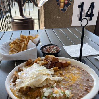 Don Pancho's - Don Panchos Chilaquiles, consist of regular red chilaquiles with Chile verde pork meat and refrained beans along with potatoes - Mexican Near Me - Wildomar, California
