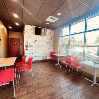 Domino's Pizza - a dining area with red chairs - Pizza Near Me - Redlands, California Domino's Pizza - a dining area with red chairs - Pizza Near Me - Redlands, California