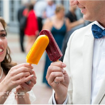 Johnny's Pops - a bride and groom holding pops - Street Vendors Near Me Johnny's Pops - a bride and groom holding pops - Street Vendors Near Me