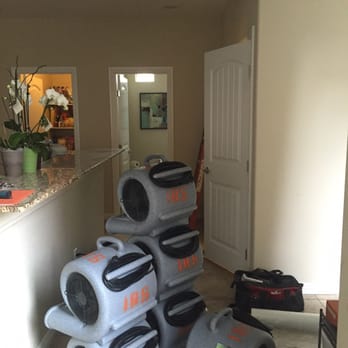 Water Damage Las Vegas - Prepping the dryers to place around the house where there was water damage. - Damage Restoration Near Me - Las Vegas, Nevada Water Damage Las Vegas - Prepping the dryers to place around the house where there was water damage. - Damage Restoration Near Me - Las Vegas, Nevada