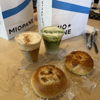 Miopane - Coffee and Match Einspanner (Drinks) Sweet Milk Crumble Bagel (Left) Roasted Tomato and Herbs Bagel (Right) - Bakeries Near Me - Pasadena, California