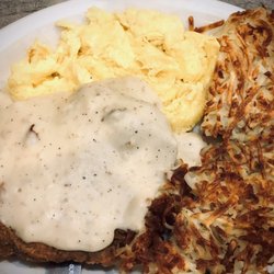 The Kafana - Chicken Fried Steak & scrambled eggs w/ a side of hashbrowns.