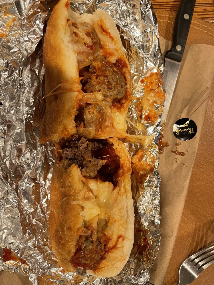 Denny's Submarine Sandwich Shop Logo