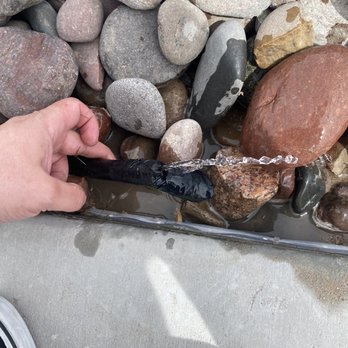 Alpha Innovations Construction & Remodeling - a person using a brush to clean rocks - Masonry/Concrete Near Me - El Paso, Texas Alpha Innovations Construction & Remodeling - a person using a brush to clean rocks - Masonry/Concrete Near Me - El Paso, Texas