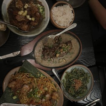 Tradicionale - pork dishes, garlic rice and greens and  noodles. - Filipino Near Me - New York, New York
