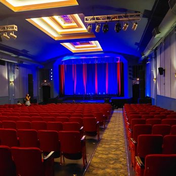 The Parkway Theater - rows of red chairs facing a stage - Venues & Event Spaces Near Me - Minneapolis, Minnesota The Parkway Theater - rows of red chairs facing a stage - Venues & Event Spaces Near Me - Minneapolis, Minnesota