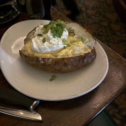 Baked potato with a cheese sauce