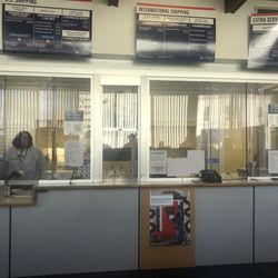 United States Post Office - One employee and a long line of customers.