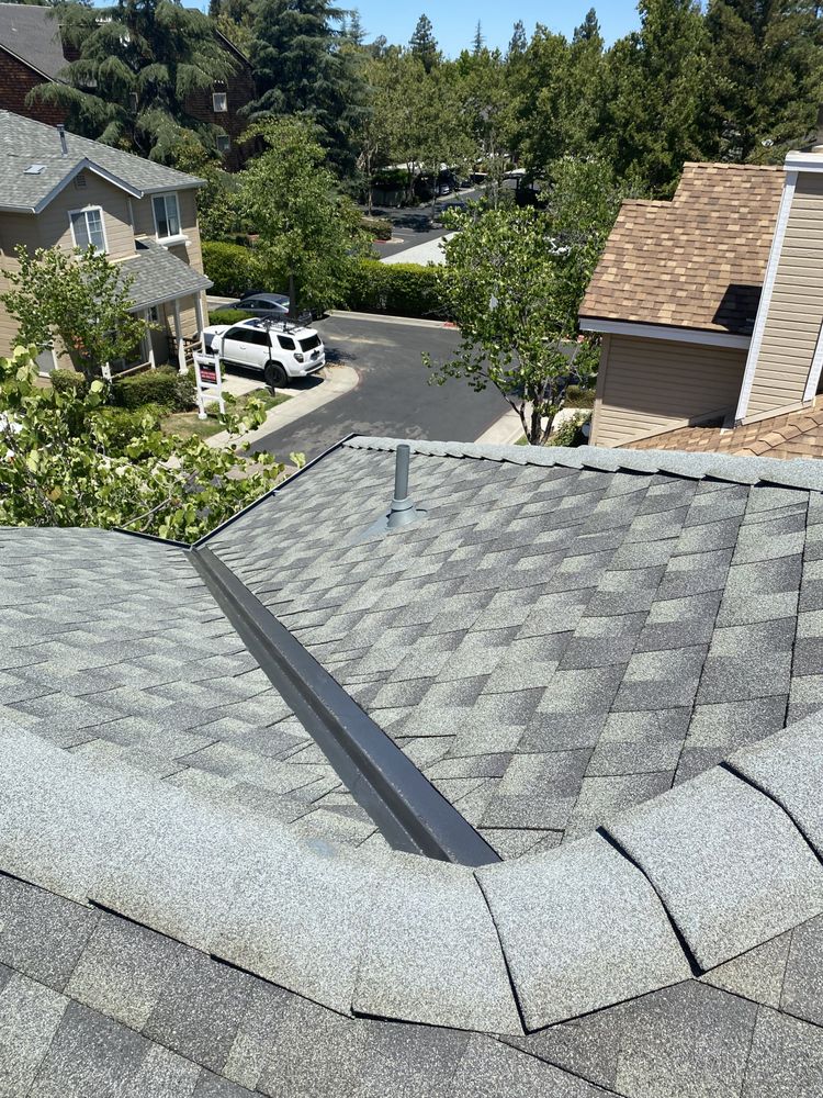Slide of Tip Top Roofing
