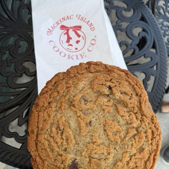 Mackinac Island Cookie Co - Peanut butter chocolate chunk cookie (you can't see my hand holding the cookie because these cookies are huge!) - Desserts Near Me - Mackinac Island, Michigan Mackinac Island Cookie Co - Peanut butter chocolate chunk cookie (you can't see my hand holding the cookie because these cookies are huge!) - Desserts Near Me - Mackinac Island, Michigan