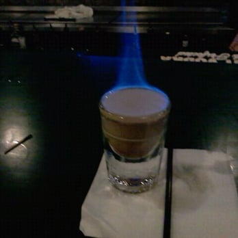 Mulligan's Pub - a shot of coffee with a blue flame - Pubs Near Me - Grand Rapids, Michigan
