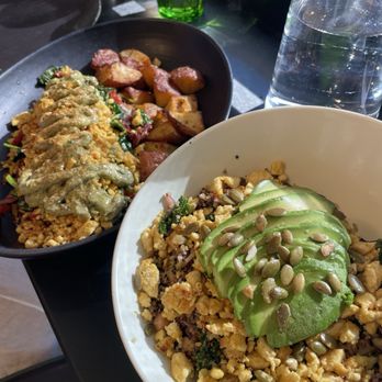 Moondog Cafe & Bakery - The Vegan eggs Benedict (left), and the Feel Good Bowl - Breakfast & Brunch Near Me - Mancos, Colorado Moondog Cafe & Bakery - The Vegan eggs Benedict (left), and the Feel Good Bowl - Breakfast & Brunch Near Me - Mancos, Colorado