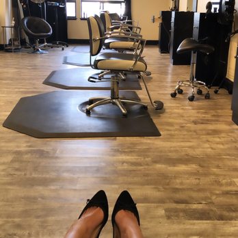 Eminence - Client behind the scenes at the shampoo bar - Hair Salons Near Me - Salinas, California