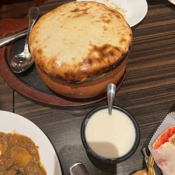 Royal Oak Masala - a variety of dishes on a table - Indian Near Me - Royal Oak, Michigan Royal Oak Masala - a variety of dishes on a table - Indian Near Me - Royal Oak, Michigan
