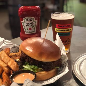 No-Li Brewhouse - Cajun Spicy Chicken Sandwich with Fries and Porch Glow beer - Pubs Near Me - Spokane, Washington
