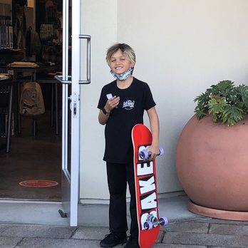 The Fort - Stoked on his new skate - Men's Clothing Near Me - Laguna Niguel, California The Fort - Stoked on his new skate - Men's Clothing Near Me - Laguna Niguel, California