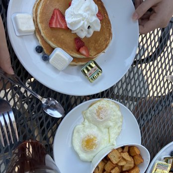 Another Broken Egg Cafe - Mixed Berry stuffed pancakes with over medium eggs and a side of home fries...delicious! - Breakfast & Brunch Near Me - Huntsville, Alabama Another Broken Egg Cafe - Mixed Berry stuffed pancakes with over medium eggs and a side of home fries...delicious! - Breakfast & Brunch Near Me - Huntsville, Alabama