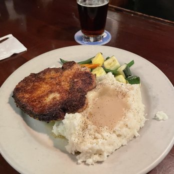 Murphy's Bar & Grill - Garlic crusted pork chop meal - Irish Pub Near Me - Honolulu, Hawaii Murphy's Bar & Grill - Garlic crusted pork chop meal - Irish Pub Near Me - Honolulu, Hawaii