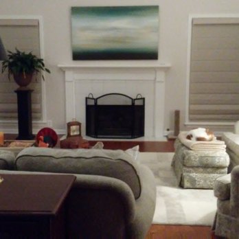 ARJ Remodeling - living room with raised floor and windows - General Contractors Near Me