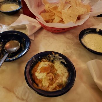 Chuy's - My small portion of one scoop guacamole and one small bowl of refried beans. - Mexican Near Me - Round Rock, Texas