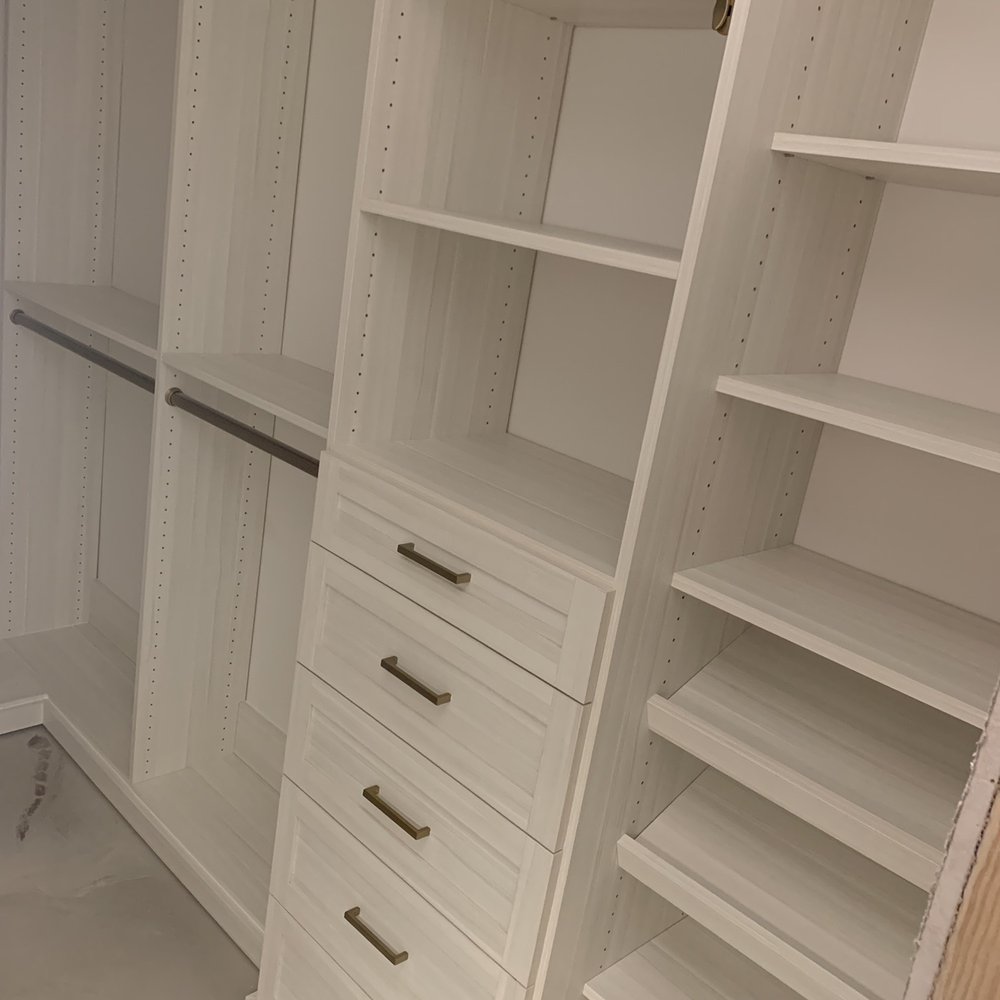Husbands side of closet