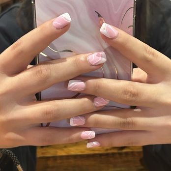Paradise Nail & Spa - Pink acrylic nails with white designs - Nail Salons Near Me - Minocqua, Wisconsin Paradise Nail & Spa - Pink acrylic nails with white designs - Nail Salons Near Me - Minocqua, Wisconsin