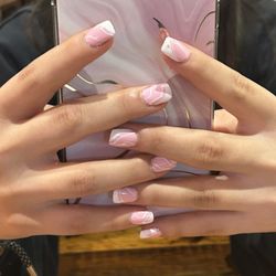 Paradise Nail & Spa - Pink acrylic nails with white designs