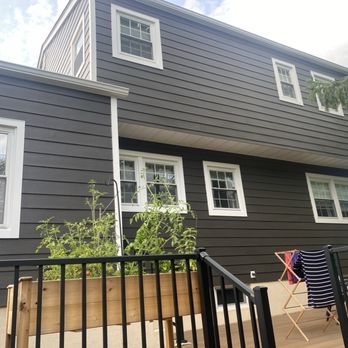 Munz Roofing & Siding - Back of house, disregard the laundry - Roofing Near Me - Bristol, Pennsylvania