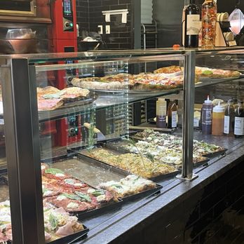 Taglio Pizza - Pizza - Pizza Near Me - Mineola, New York Taglio Pizza - Pizza - Pizza Near Me - Mineola, New York