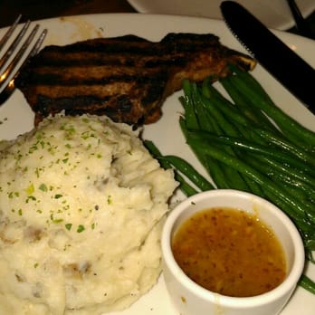 Outback Steakhouse - Wood grilled pork chop, green beans & garlic mash - Steakhouses Near Me - Springfield, Pennsylvania