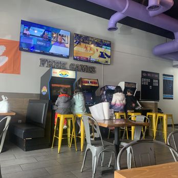 Voodoo Wing Co. - Game area - Chicken Wings Near Me - Fort Mill, South Carolina Voodoo Wing Co. - Game area - Chicken Wings Near Me - Fort Mill, South Carolina