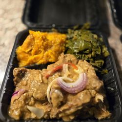Keith & Sons Soul Food Cafe - Smothered pork chops w collards greens and sweet potatoes