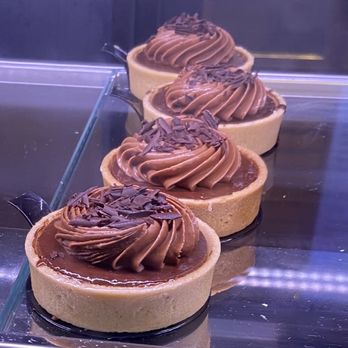 BonDivan - a row of desserts with chocolate frosting - Desserts Near Me - Dearborn, Michigan