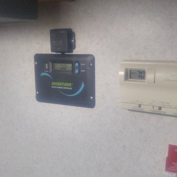 Aaron's Mobile RV Service - Renogy Adventurer Controller with blue tooth next to my RV temp controller - RV Repair Near Me