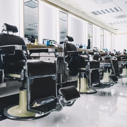 Paradox - Our vintage barber chairs set against our modern barber stations.