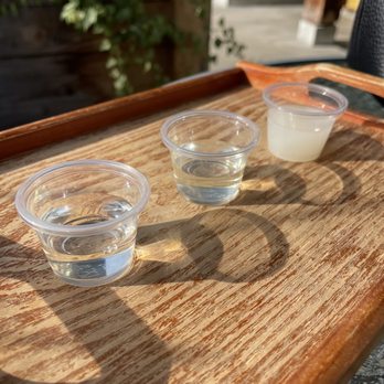Artisan Sake Maker - three glasses of water on a wooden tray - Wineries Near Me - Vancouver, British Columbia Artisan Sake Maker - three glasses of water on a wooden tray - Wineries Near Me - Vancouver, British Columbia