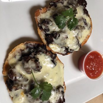 El Taller - Mollettes with mild salsa on the side - Bookstores Near Me - Lawrence, Massachusetts El Taller - Mollettes with mild salsa on the side - Bookstores Near Me - Lawrence, Massachusetts