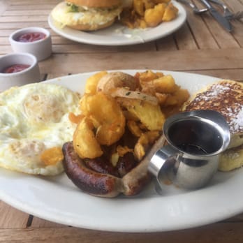 Plow - "The Plow": two eggs over medium, chicken Apple sausage, some amazing house potatoes, and two delicious lemon ricotta pancakes! - Breakfast & Brunch Near Me - San Francisco, California