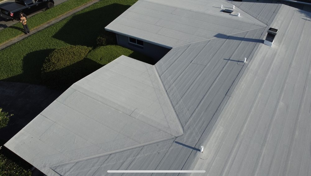 Slide of Tip Top Roofing