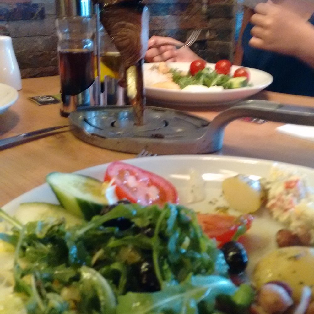 Salad and beef (in the background) Salad and beef (in the background)