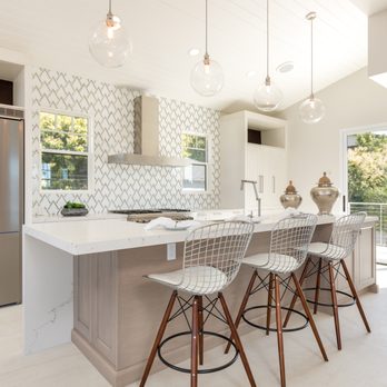 Custom Design & Construction - a kitchen with stainless steel appliances - General Contractors Near Me - El Segundo, California