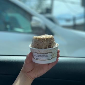 Il Pastificio - a hand holding a cup of ice cream - Bakeries Near Me - Everett, Massachusetts