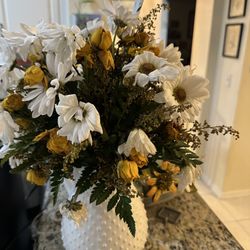 Not even a week after receiving the flowers. Wilting showing more of the gaping holes. Daisies usually last at least a month.
