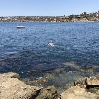 La Jolla Cove - My boyfriend swimming at the bottom of the cliffs by the cove - Parks Near Me - La Jolla, California La Jolla Cove - My boyfriend swimming at the bottom of the cliffs by the cove - Parks Near Me - La Jolla, California