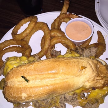 Murray's Saloon & Eatery - Beef dip sandwich on a French roll with added cheese and comes with onion rings or fries for $10. - Karaoke Near Me - Big Bear Lake, California