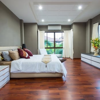 Home Services - a bedroom with a bed, dresser, and tv - General Contractors Near Me Home Services - a bedroom with a bed, dresser, and tv - General Contractors Near Me